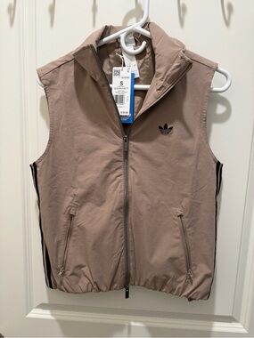 adidas woman Sleeveless Zip Vest in Taupe with Black Trim